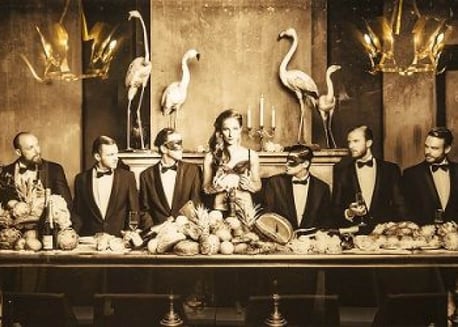 A group of people in a dining table